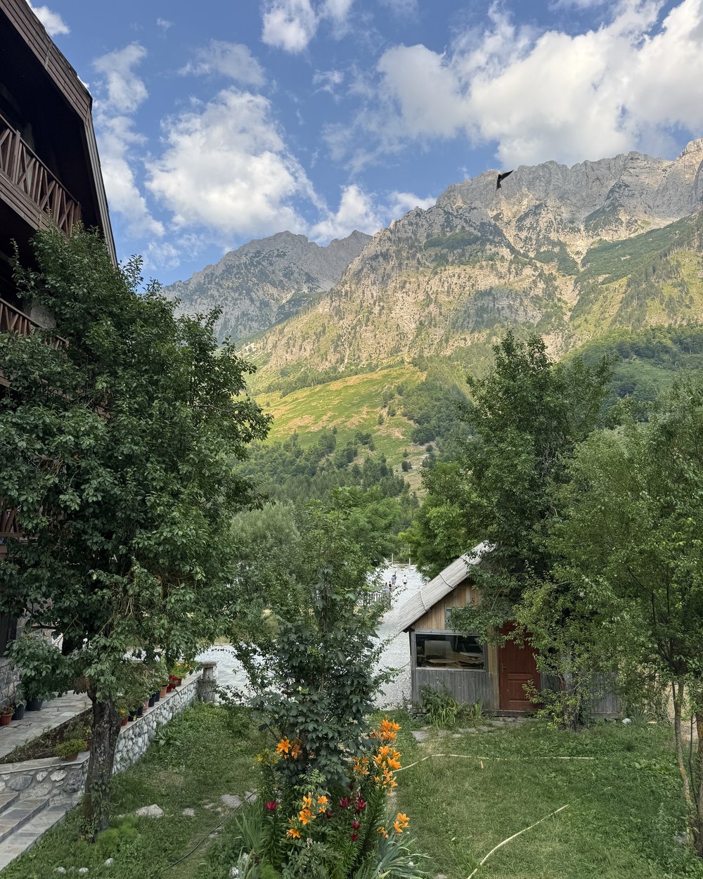 Guesthouse and garden below the mountains in the Valbonë valley, Albania
