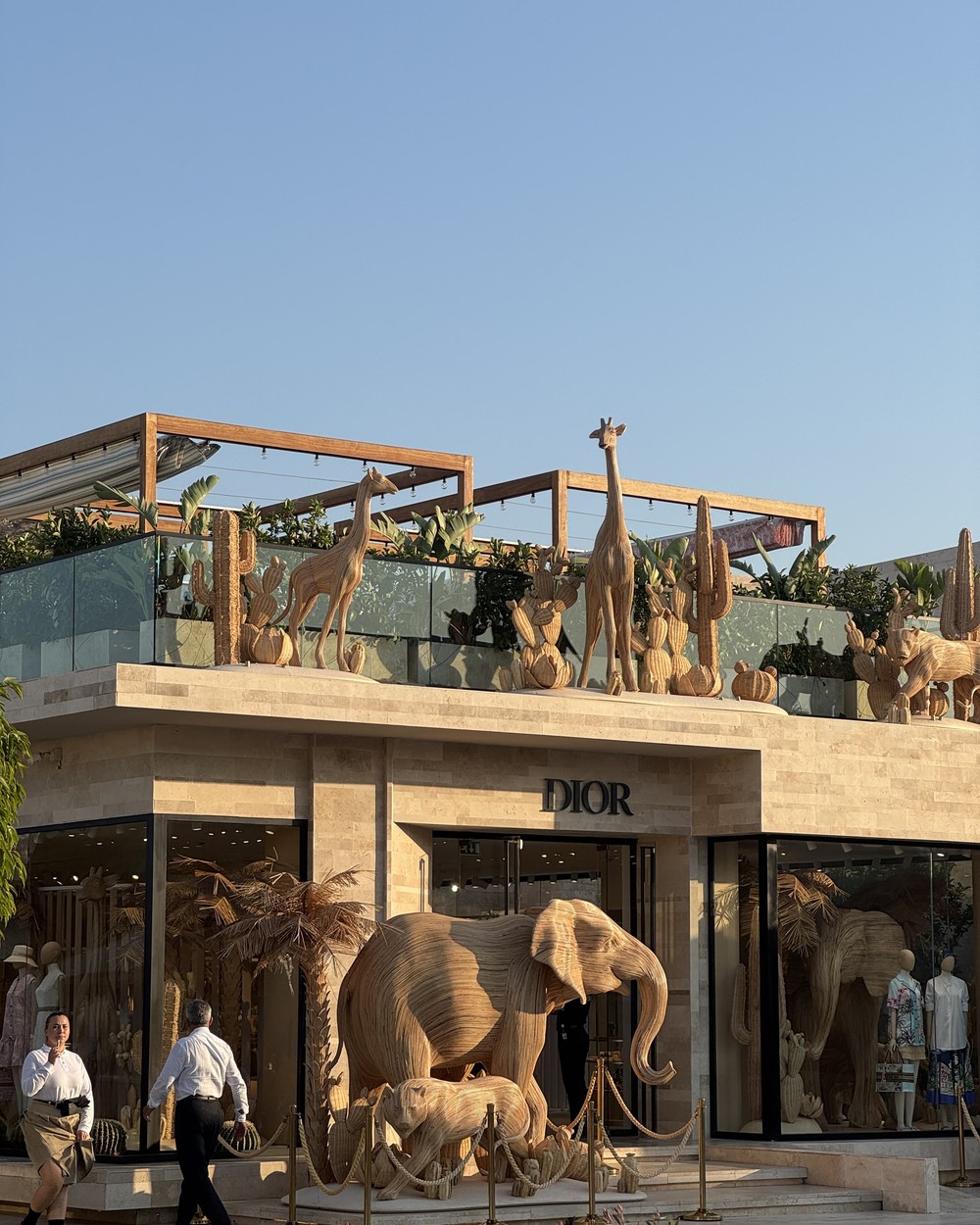Dior storefront with large sculpted elephants outside in the designer shopping district in Bodrum