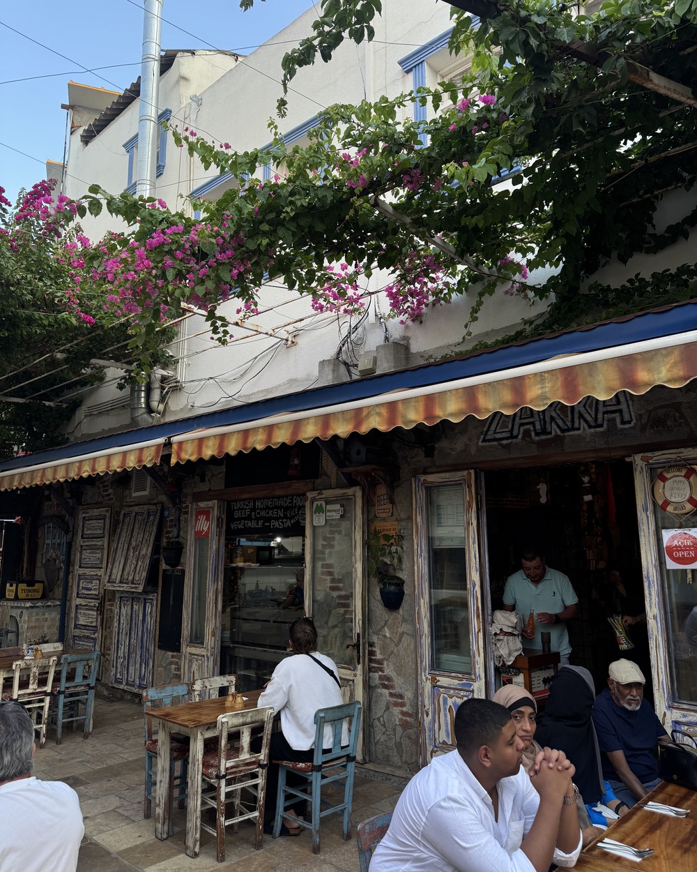 The Zakka cafe restaurant shopfront in Bodrum old town with people eating outside