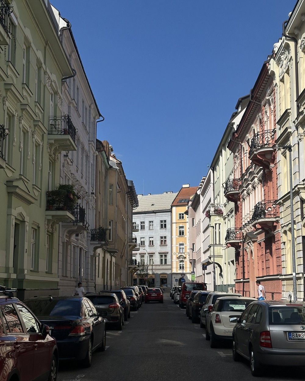A pastel street of old town buildings in Bratislava, Slovakia