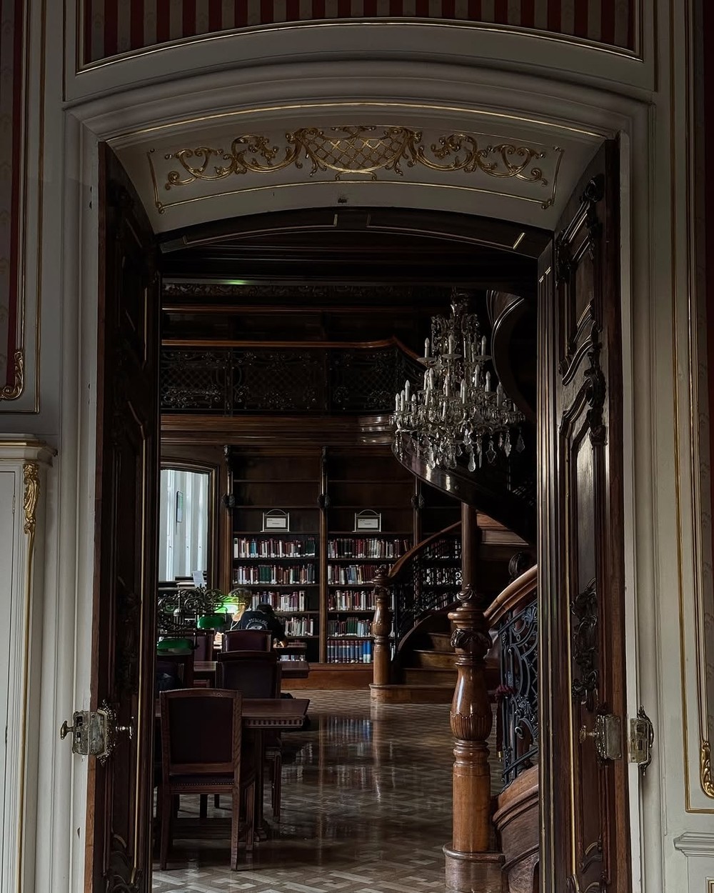 The gilded reading room of the Metropolitan Ervin Szabo Library in Budapest