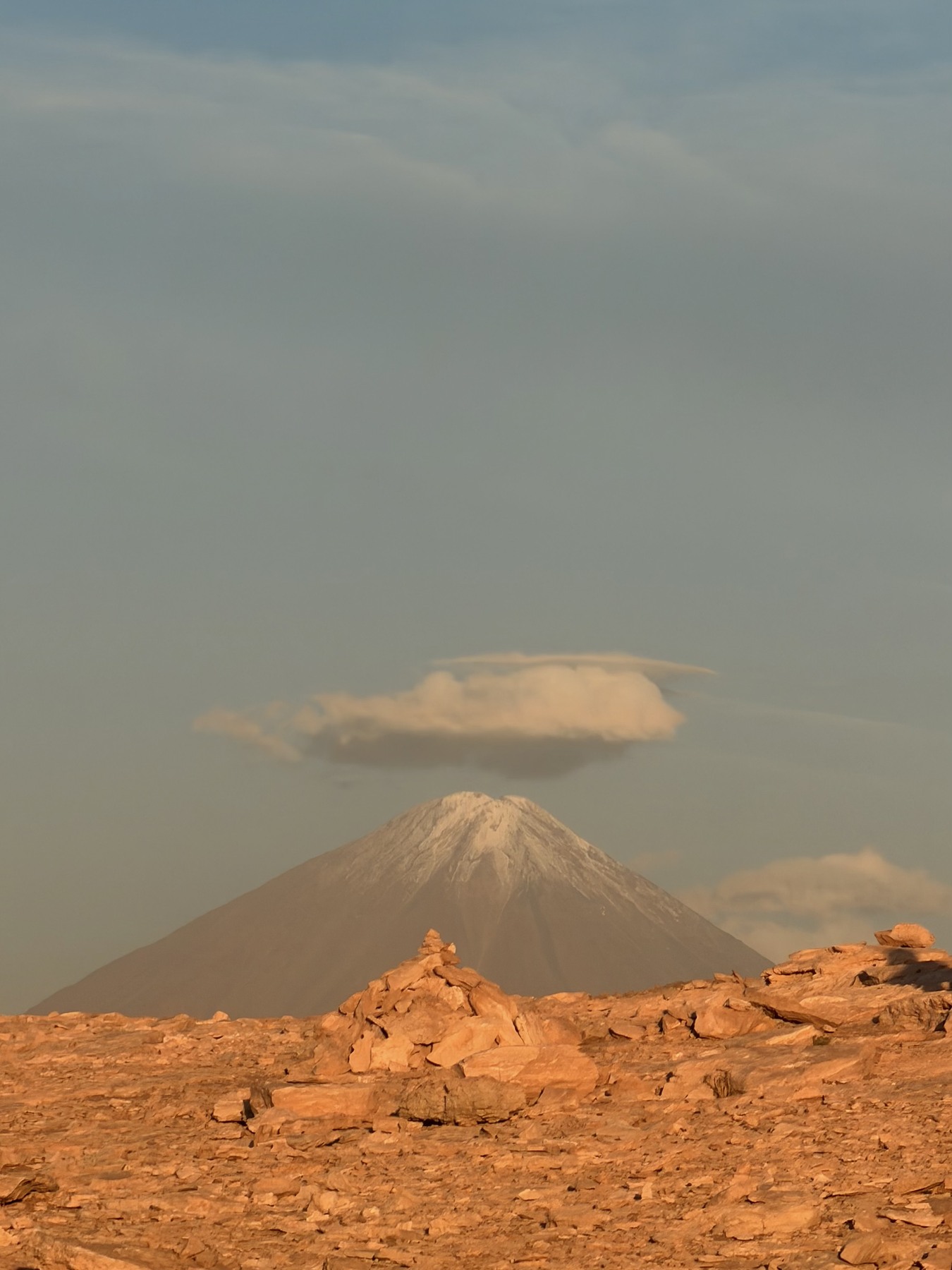 Evening light on a volcano viewed from the Atacama Desert