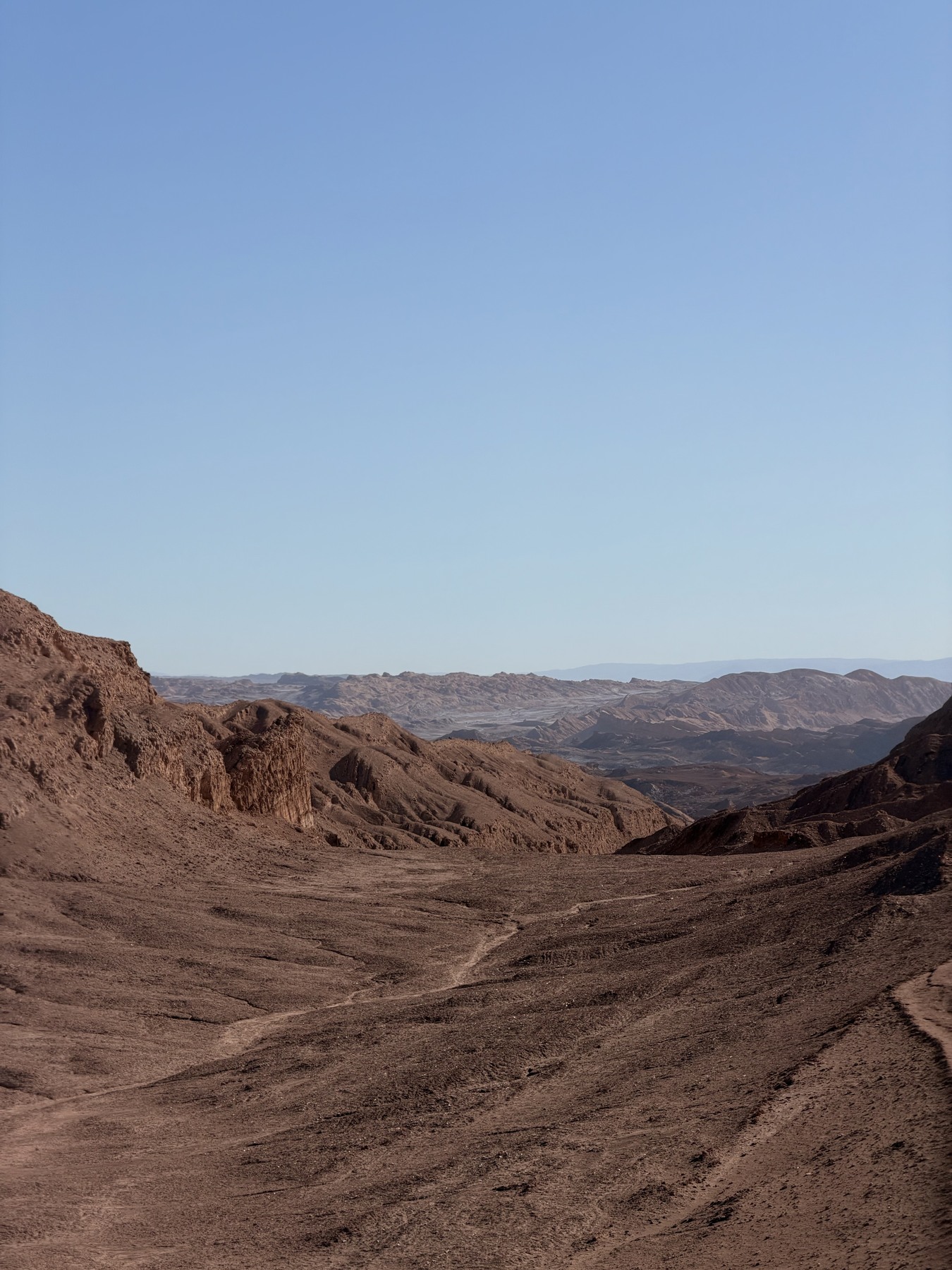Rocky ridges and a winding valley in the Atacama Desert