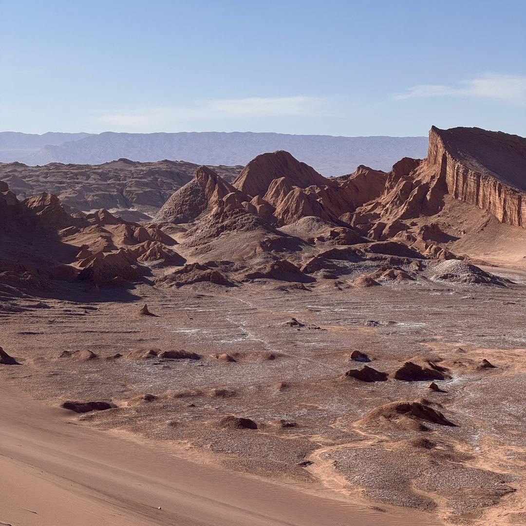Sand dunes and rugged ridges in Valle de la Luna near San Pedro de Atacama