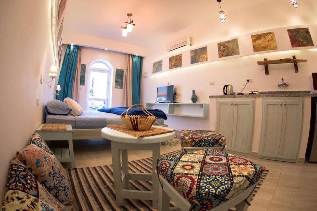 Apartment living space and kitchenette at Skyrock Dahab