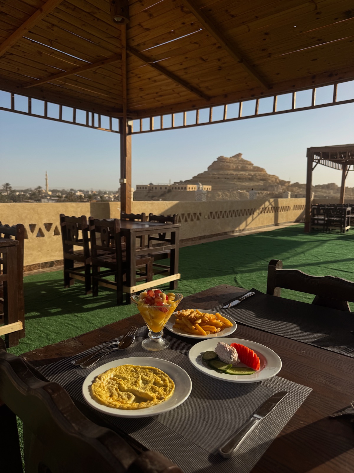 Breakfast at Hotel Talid overlooking the Mountain of the Dead in Siwa Oasis