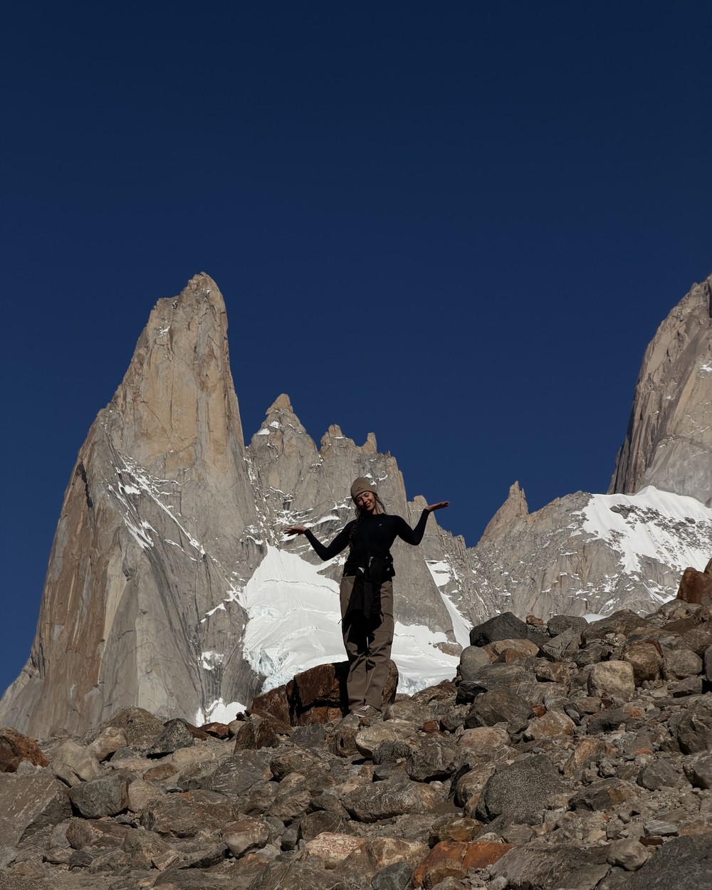 Ellen on the boulders below Fitz Roy before the walk back down