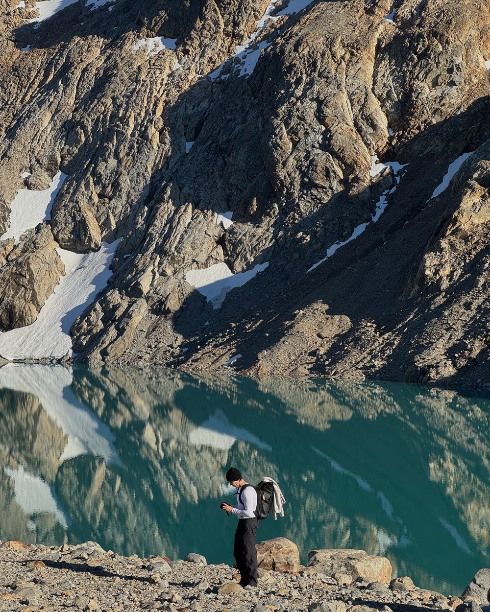 Daniel at the edge of Laguna de los Tres beneath the Fitz Roy peaks