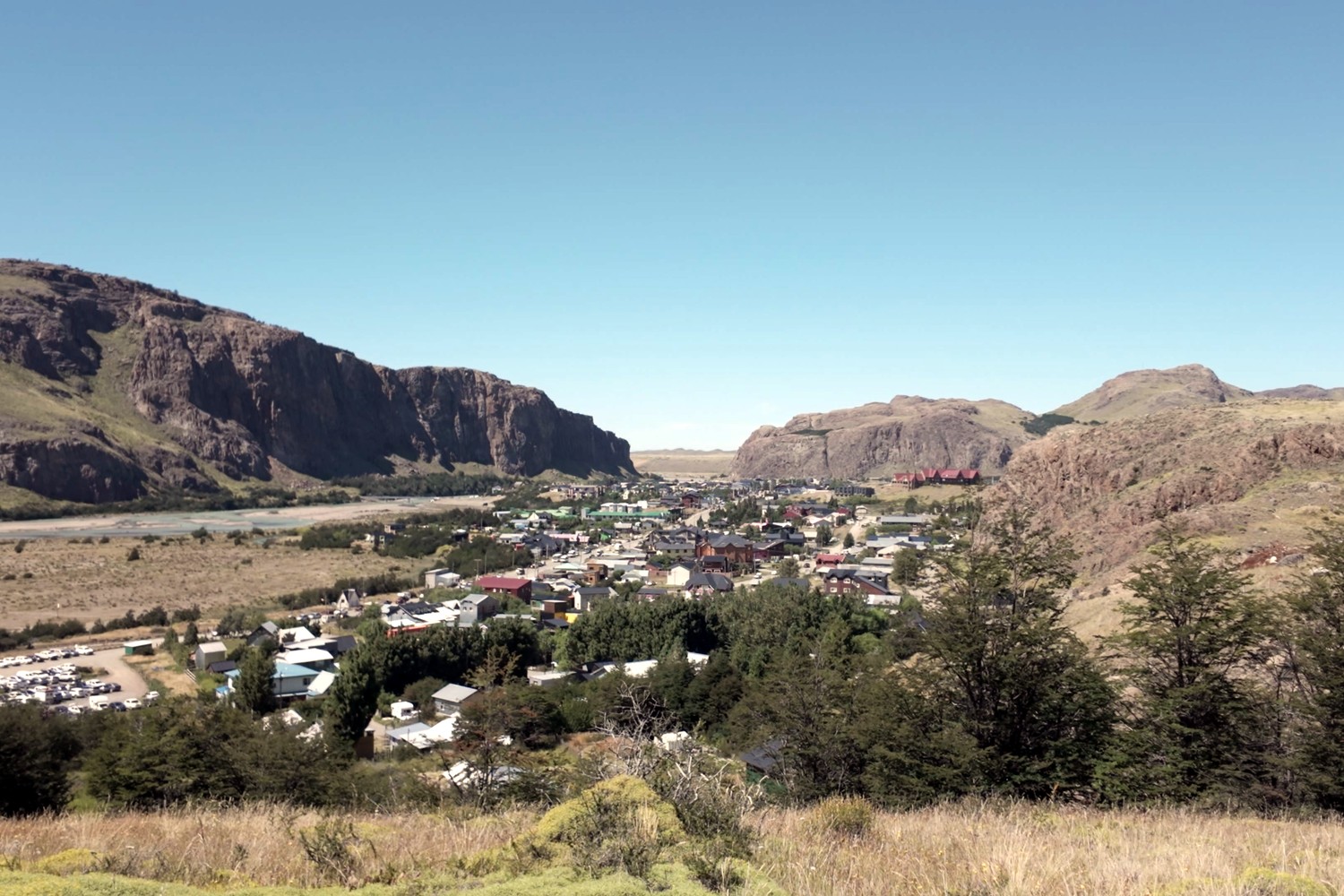 El Chaltén from the trail above town, tucked into the valley
