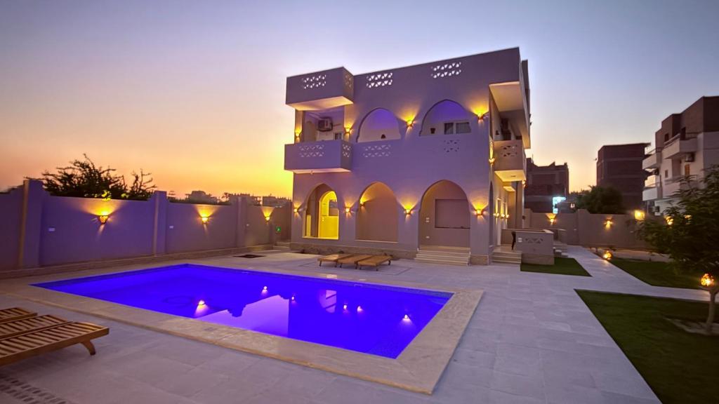 Swimming pool and garden in front of Magic Garden House on Luxor's West Bank