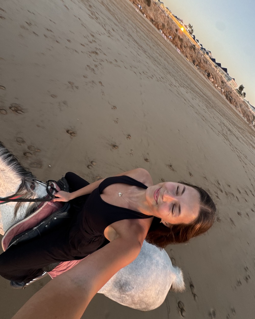 Lying on the sand at the beach in Tamraght on the Moroccan Atlantic coast