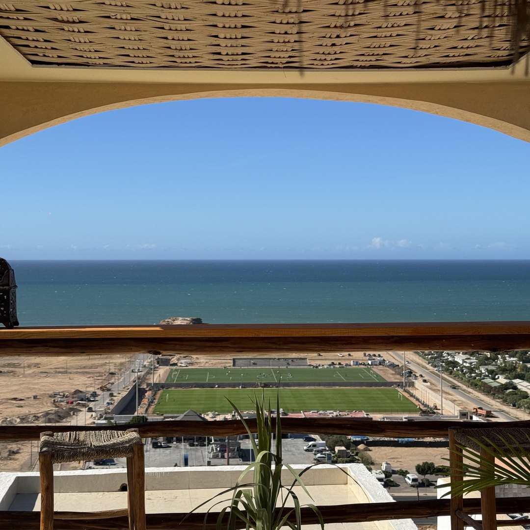 Terrace looking out over the coastline and rooftops at Tamraght, Morocco