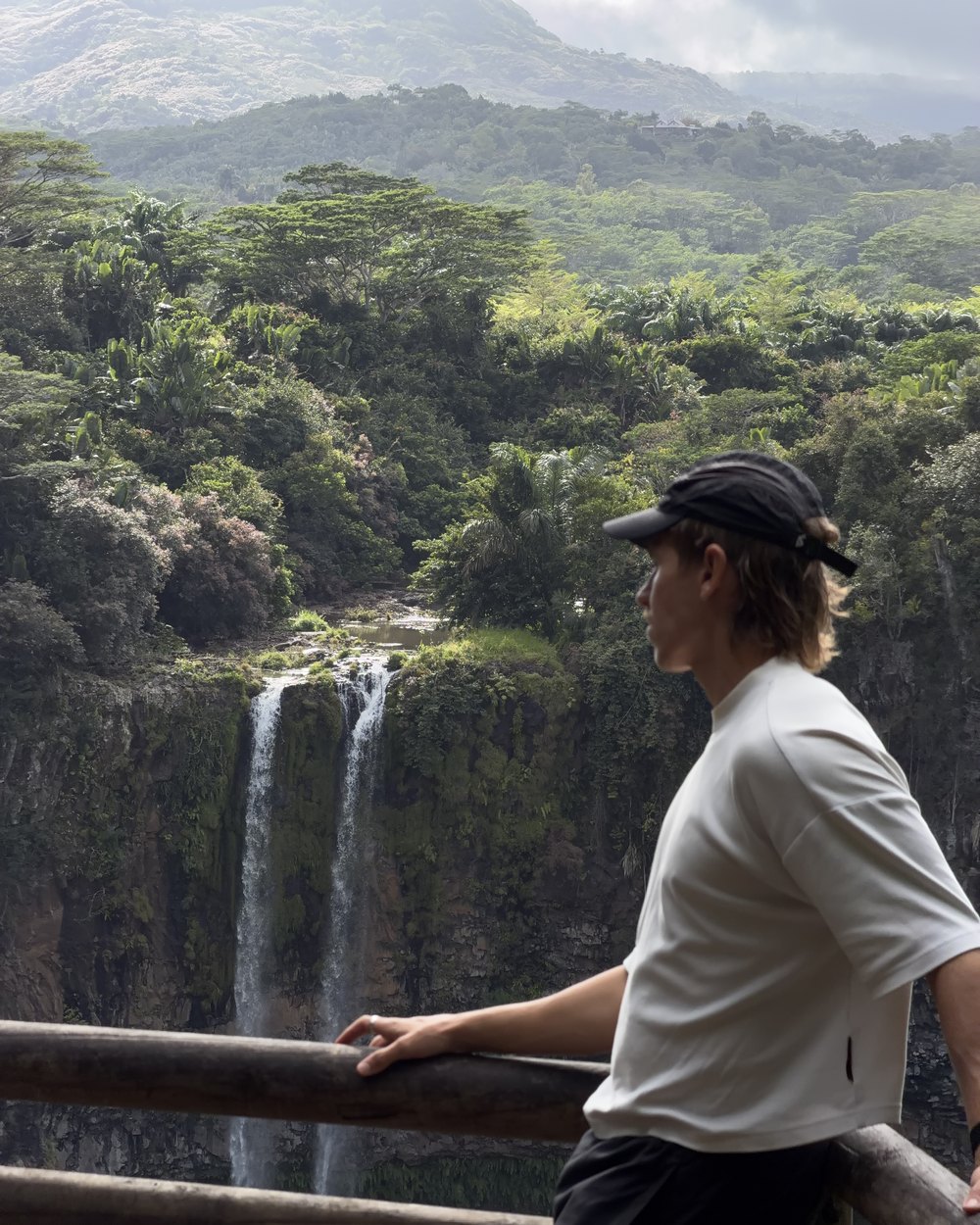 Daniel looking out at Chamarel waterfall in Mauritius, before our Air France flight to Paris on points