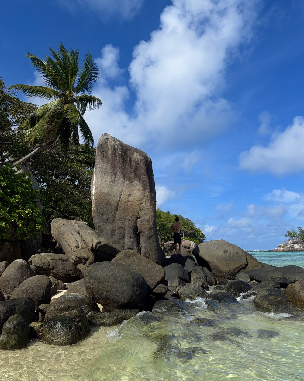 Granite rocks and turquoise shallows at Anse Royale beach on Mahe