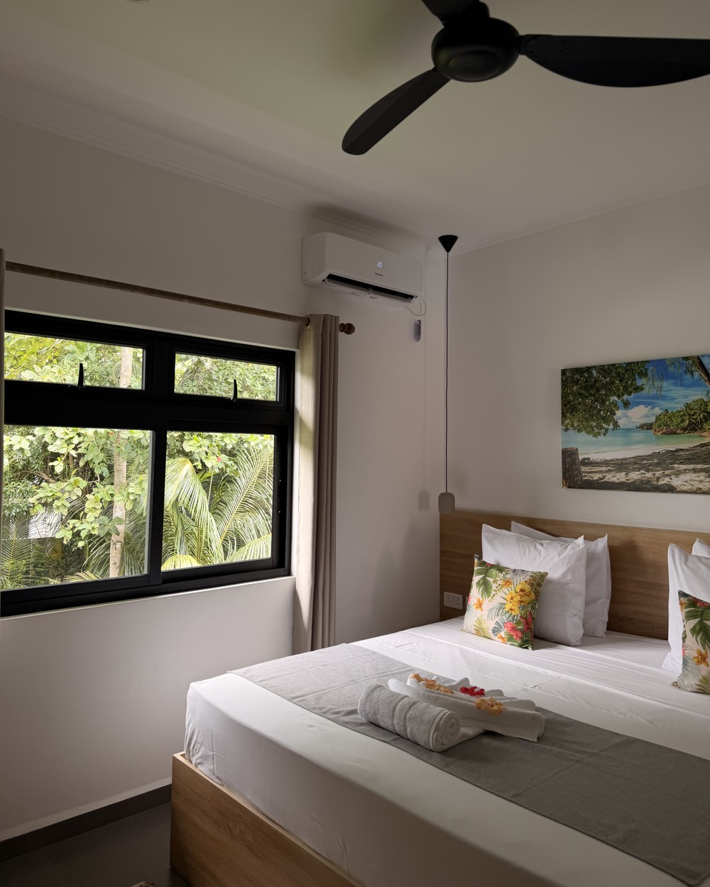 The self-catering apartment and tropical surroundings at our Praslin base