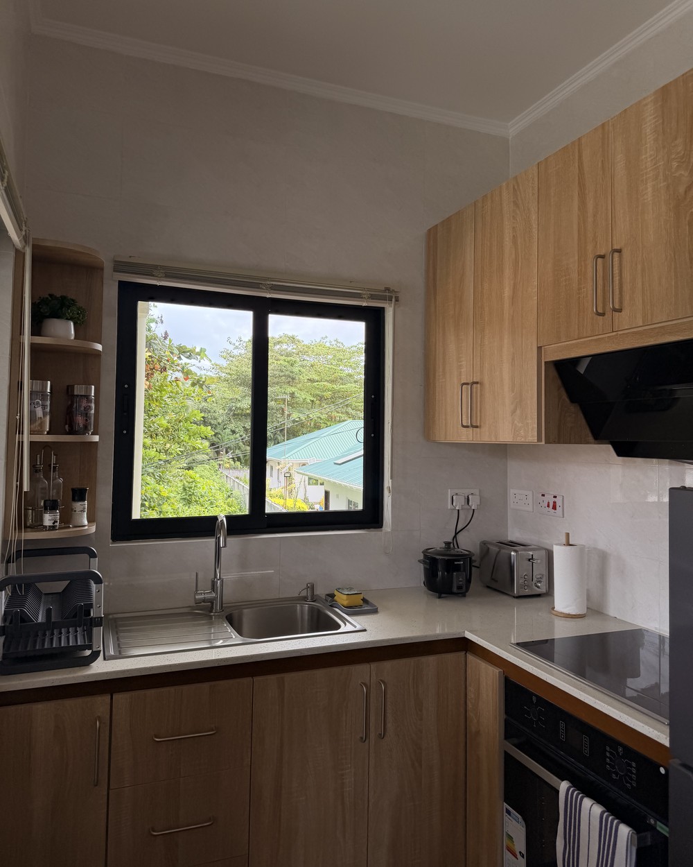 The Chez Rona guesthouse on Praslin, Seychelles, surrounded by tropical greenery