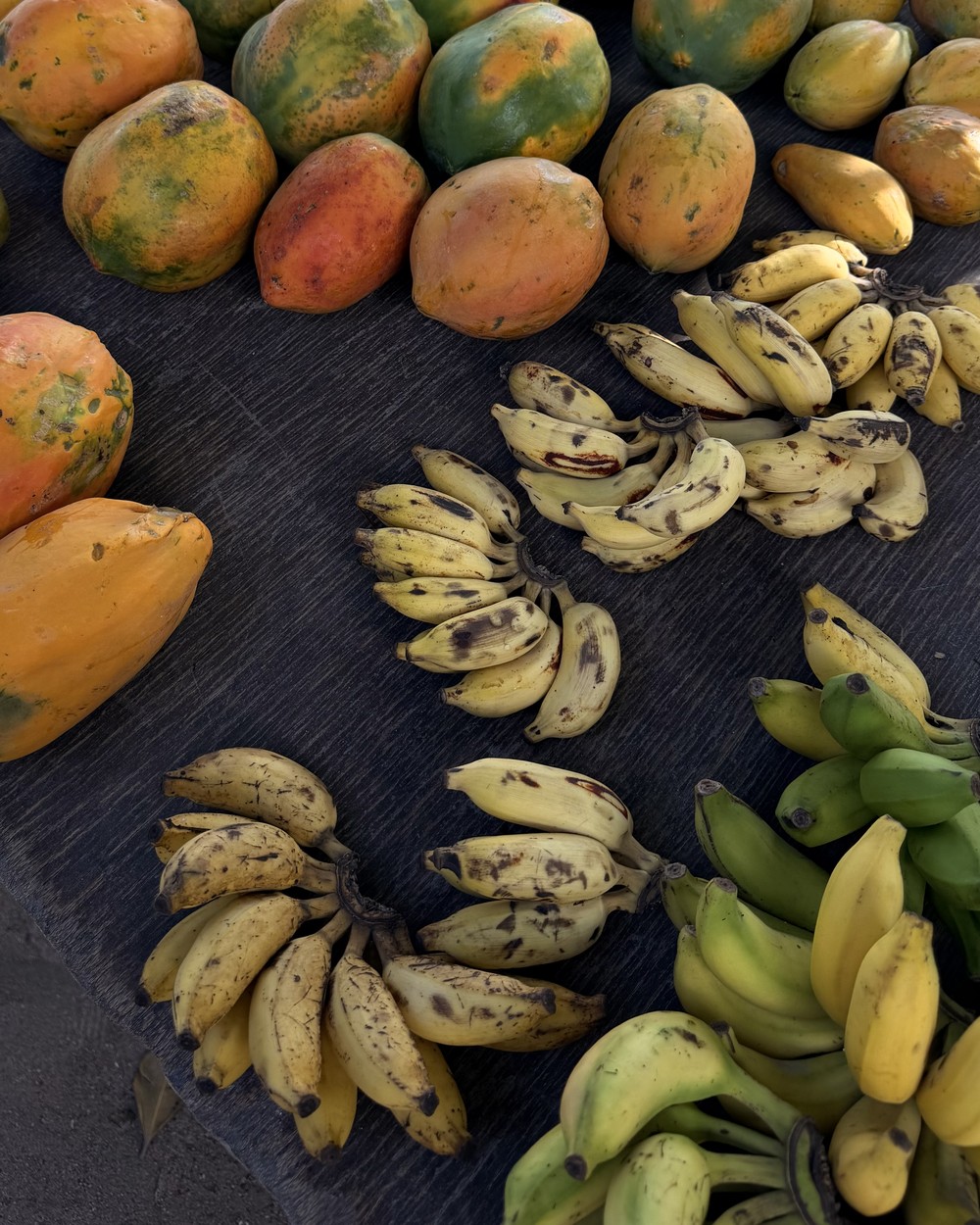 Fresh bananas, papaya and star fruit at the morning market on La Digue