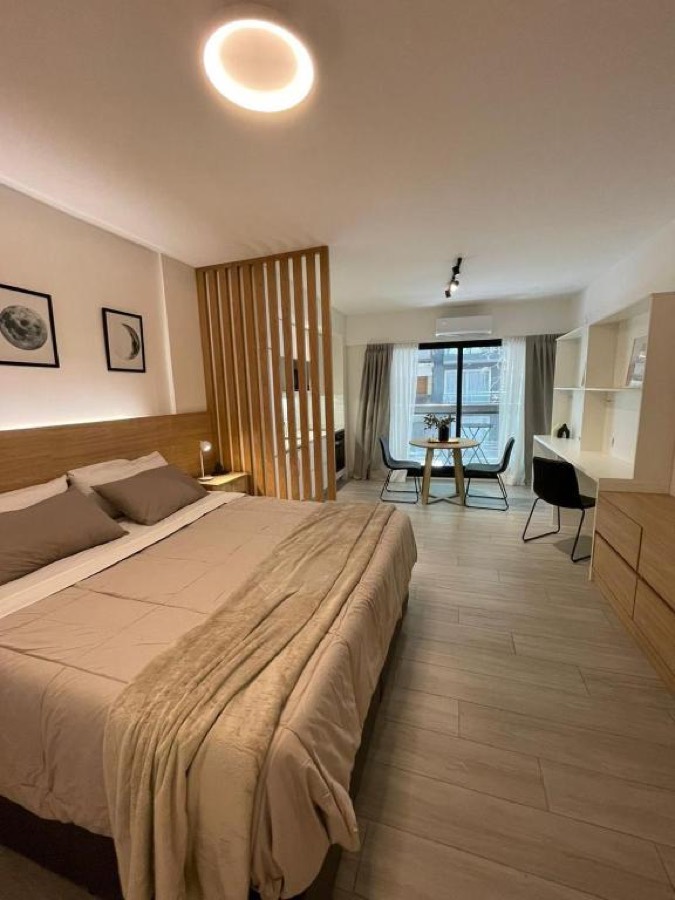 Bedroom and living space at Monoambiente Borges Palermo Soho in Buenos Aires