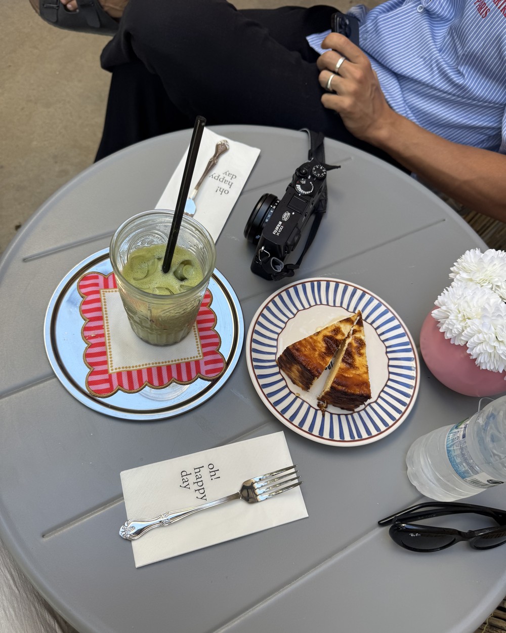Strawberry matcha drink and cheesecake on a table at Palacaki Hotel and Cafe in Alaçatı