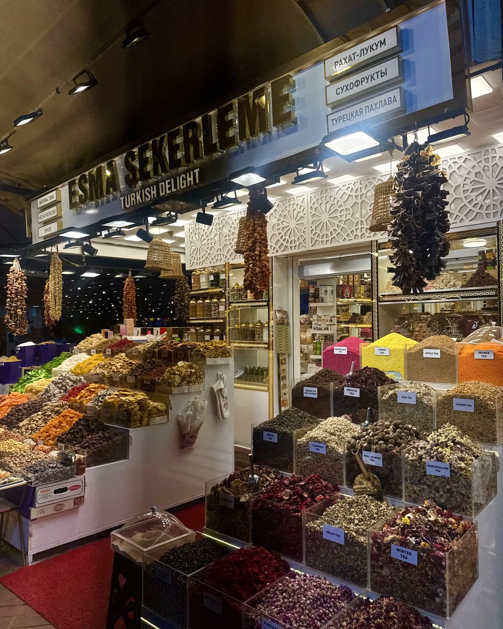Spice and dried fruit stall with baskets of colourful produce in Fethiye old town