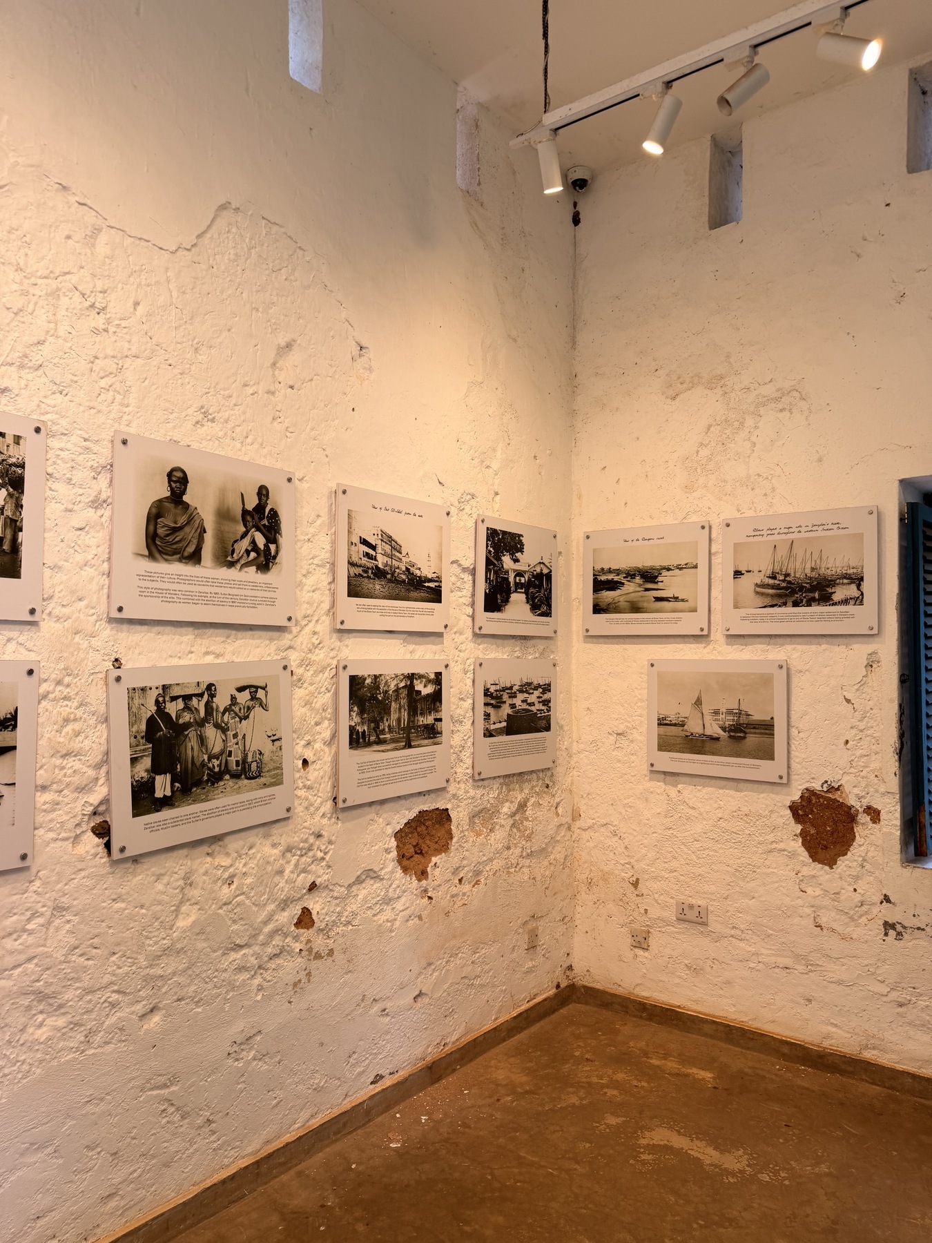 Historic photographs and information panels inside the Prison Island museum display