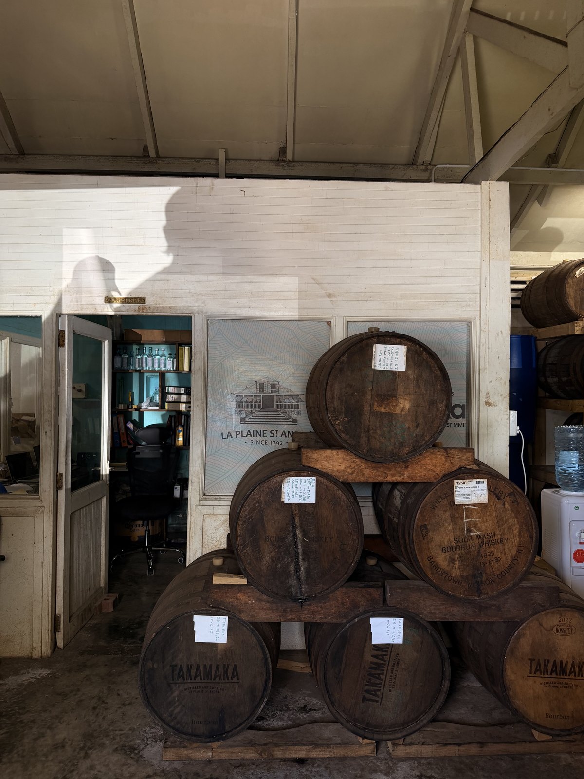 Takamaka rum barrels inside the historic distillery on Mahe
