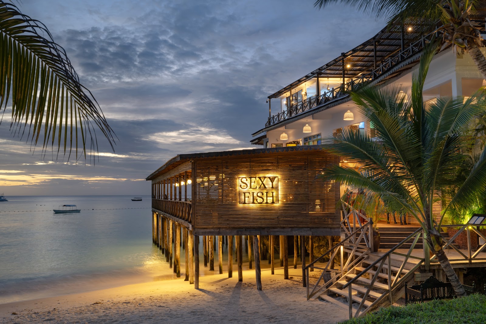 The Z Hotel lit up on the beachfront at Nungwi at dusk