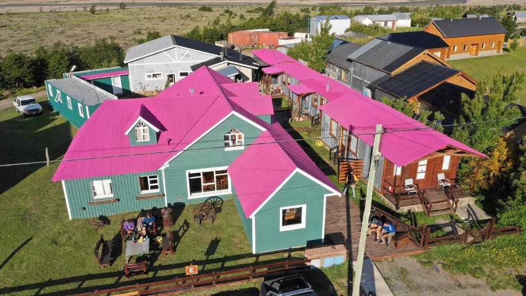 Lo de Trivi's green and pink buildings from above in El Chaltén
