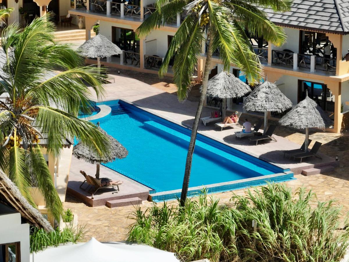 Pool and sun loungers at Mahali Zanzibar in Paje